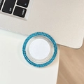 Detail of circular phone socket featuring double rows of sparkling blue rhinestones - Blue