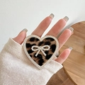 Close-up of heart-shaped phone grip with leopard print and rhinestone bow detail - Transparent Stand - Rhinestone Heart Bow - Small Leopard Print - Brown