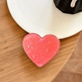 Détail du support cœur rouge pastèque avec paillettes étoiles et bordure en métal argenté - Support Coeur Galvanisé - Coquillage Étoilé - Rouge Andorre