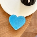 Gros plan d'un support de téléphone cœur avec paillettes bleues et étoiles - Support Coeur Galvanisé - Coquillage Étoilé - Bleu Royal