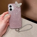 Detail of pink rhinestone iPhone case with 3D butterfly decor and matching wrist strap - Acrylic Pink Rhinestone Butterfly With Strap / iPhone 17 Pro Max