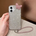 Close-up of sparkling rhinestone iPhone case with 3D butterfly and crystal wrist strap - Acrylic Dazzling Rhinestone Butterfly With Strap / iPhone 17 Pro Max