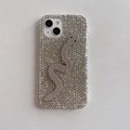Close-up of luxury rhinestone iPhone case with 3D crystal-studded snake decoration - iPhone 17 Pro Max / Iridescent