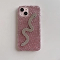 Detail of pink rhinestone iPhone case with a silver crystal snake design and luxury finish - iPhone 17 Pro Max / Pink