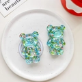 Nahaufnahme von 3D-Bären-Handyhalterung mit glitzernden Pailletten und klarem Harzdesign - Transparenter Ständer / Bär - Bunte Pailletten - Nr. 3