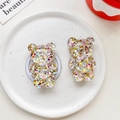Nahaufnahme der glitzernden Bären-Handyhalterung mit bunten Pailletten in Harz - Transparenter Ständer / Bär - Bunte Pailletten - Nr. 4