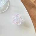 Dettaglio supporto telefono a fiore 3D con paillettes a cuore rosa e glitter su tavolo - Stile Cuore di Zucchero ai Fiori di Ciliegio / Bianco
