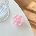 Macro dettaglio del supporto cellulare a fiore rosa con glitter a forma di cuore - Stile Cuore di Zucchero ai Fiori di Ciliegio / Rosa