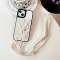 Dettaglio custodia per telefono in pelle crema con portacarte e tracolla dorata - Bianco / iPhone 17 Promax