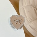 Macro side view of khaki leather heart phone socket with rhinestone bow and trim - Magnetic Rhinestone Heart Bow-Leather Texture / Khaki