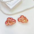 Close-up of cloud-shaped glitter resin phone grip with pink and gold sequins details - Cloud - Colorful Sequins - No. 12