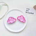 Close-up of pink glitter cloud phone socket stand on a ceramic tray with pearls - Pearlescent Cloud-Rose Red