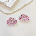 Close-up of cloud-shaped phone grip featuring sparkling pink and purple sequins and glitter - Cloud - Colorful Sequins - No. 7