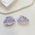 Macro shot of purple sequin cloud phone grip with retractable socket base and glitter - Cloud - High-Glow Sequins - Purple