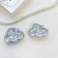 Macro shot of silver cloud phone socket with holographic sequins on a white background - Cloud - Iridescent Sequins - Silver
