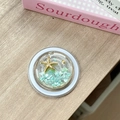 Detail of a round ocean style phone grip with starfish, seashells and green stones - Magnetic Starry Sky Starfish Shell Stone / Green
