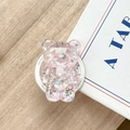 Dettaglio di un supporto per telefono a forma di orso rosa con glitter laser e base - Orso Glitter Magnetico / Rosa