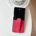 Detail of rose pink litchi leather texture and finger strap on Galaxy Z Flip6 case - Rose Red