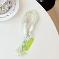 Detail of light green braided phone strap with translucent butterfly pendant and bow - Smiley Short Rope + Green Patch + Gradient Butterfly / Green