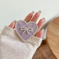 Purple heart phone socket grip with glitter and crystal bow decoration in hand - Transparent Stand - Rhinestone Heart Bow - Sequin - Purple