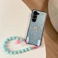 Detail of light blue leather phone case for Z Flip 6 with bowknot and beaded lanyard - Pearly Blue (With Bow Heart Chain) / Samsung Z Flip 3