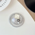 Dettaglio di un supporto per telefono rotondo con strass, marmo e stella d'argento - Serie Argento N. 4(银系4号)