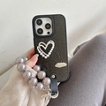 Detail of black wrinkled leather phone case with pearl heart and large wrist strap - Large-hole Pearlescent Pattern - English Lettering Openwork Pearl Heart - Bow Pearl Strand - Black / iPhone 16e