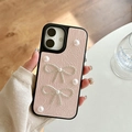 Detail of pink leather phone case with silver rhinestone bows and elegant pearls - Pink / iPhone X/XS