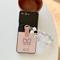 Detail of pink leather fold phone case with crystal butterfly and pearl handle strap - Pearly Texture Butterfly Silver Label Pearl Chain-Pink / Samsung Z Flip 3