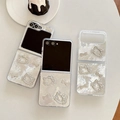 Detail van sprankelende strass-beer telefoonhoes voor Samsung Z Flip-serie - Sterrenhemel Druppelende Lijm Strass Boog Kattenoor Stijl / Samsung ZFlip3