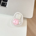 Detailed view of a resin phone grip with pink flowers and pearls on a sleek desk - Irregular Ring - Glitter Cat Eye Flower - Pink