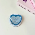 Blue heart-shaped glass phone grip with Lucky Day text on minimalist desk setup - Magnetic-Crystal Glass Heart-Lucky Blue
