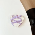 Detail of heart-shaped cream leather phone grip with dual lavender ribbon bows - Purple