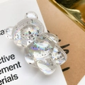 Macro shot of laser rainbow bear phone grip with silver foil flakes inside resin - Bear Grip-Silver Foil-Aurora