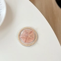 Detail einer rosa Seestern-Handyhalterung mit Glitzer und champagnergoldener Perle - Perle Magnetischer Macaron Pailletten Seestern / Orange
