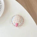 Dettaglio del supporto in peluche a scacchi a forma di ghiacciolo su base magnetica - Impugnatura Magnetica Fungo a Quadretti / Arancione