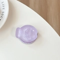 Macro detail of purple fish-shaped phone grip with glitter and pearl accents on white desk - Magnetic Matte Taiyaki Purple Glitter (With Pearl)