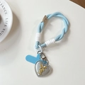 Detail of light blue braided phone strap with silver heart charm and metal clasp - Blue
