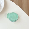 Detail of mint green fish phone grip with pearl trim and frosted glitter finish - Magnetic Matte Taiyaki Green Glitter (With Pearl)