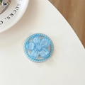 Detalle de soporte magnético azul con pétalos brillantes y borde de perlas finas - Pata de Gato Sakura con Purpurina Azul Real