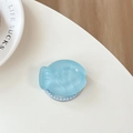 Close-up of a light blue fish-shaped phone grip with glitter and pearl decoration - Magnetic Matte Taiyaki Light Blue Glitter (With Pearl)