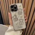 Sparkly iPhone case with white pearls, rhinestone bears and Smile lettering on silver base - White Glitter Drip Glue Rhinestone Bear Style / iPhone 17pro