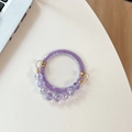 Detail of purple glitter phone stand base with iridescent crystal beads on desk - Purple Glitter + Purple Crystal Chain