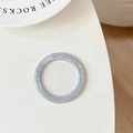 Detail of silver glitter phone grip base with a shiny textured finish on a white surface - Silver