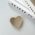 Close-up of heart-shaped phone grip with mirror center and crystal rhinestone border - Large Heart - Gold