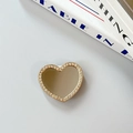 Macro shot of heart-shaped phone grip with silver mirror and rhinestones on gold base - Small Heart - Gold
