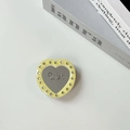 Close-up of heart-shaped magnetic phone grip with yellow rhinestones and silver mirror finish - Transparent Stand - Rhinestone Wish Heart Mirror / Yellow