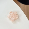 Detail of pink glitter cherry blossom flower phone grip with expandable socket - Sakura Holder - Sparkle Orange