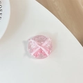 Close-up of pink glitter butterfly phone socket with bow on a coffee table background - Standard Adhesive Version - Polka Dot Glitter Glue Ribbon Bow Tie - Floral Pink