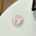 Primer plano detallado del soporte móvil de lazo rosa con borde de perlas y purpurina - Lazo de Lentejuelas Macaron / Rosa